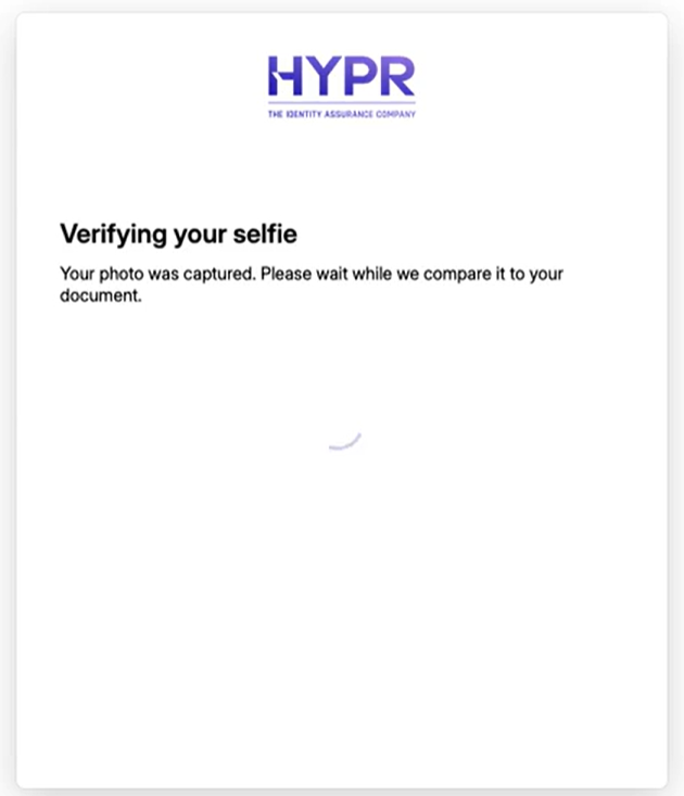 Verifying your selfie screen shown while the selfie is compared with the photo ID